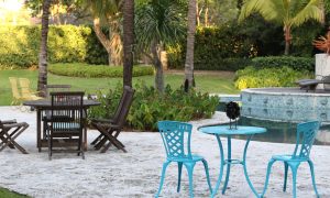 outdoor-seating-areas-on-a-home-patio-with-pool-an-2024-11-28-11-40-38-utc